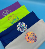 Image of four towels each with a rounded designs with varying detail created using various colors of Holographic heat transfer material.