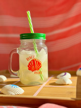 Image of a mason jar with green top and straw and a logo of a “Shell” and the words “Beach Please” surrounding it using EasyPSV Starling in Orange and Orange Soda, creating a “Shadow”.