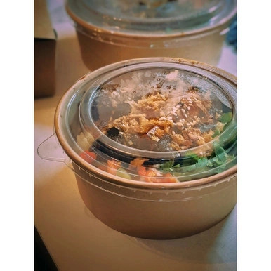Hot food under a clear lid