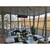 Sunstar SGL50-N10 50,000 BTU natural gas glass patio heater, installed on a screened residential porch