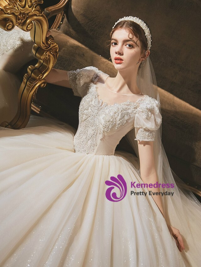 Impressive Champagne Tulle Puff Sleeve Beading Sequins Backless Wedding Dress