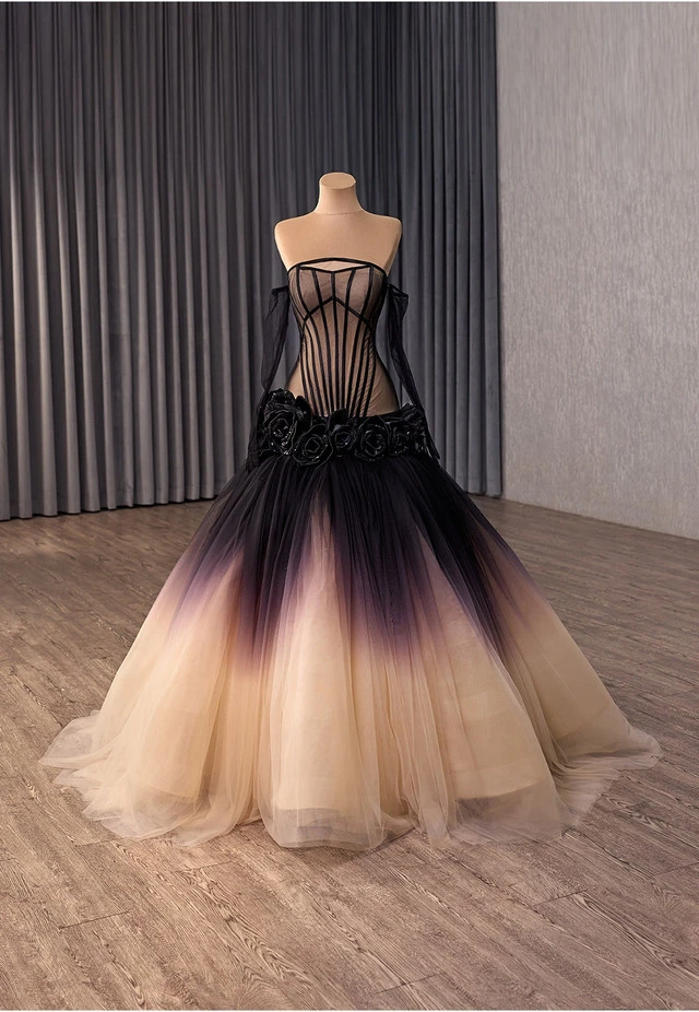 Full front view of the black gradient tulle gown with long off-the-shoulder sleeves