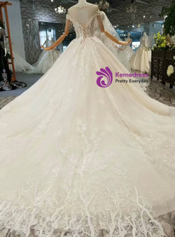 Light Champagne Tulle Sequins Appliques Backless With Beading Wedding Dress