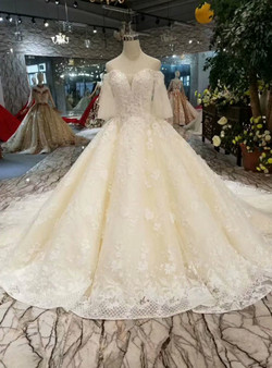 Champagne Tulle Lace Appliques Off The Shoulder Short Sleeve Wedding Dress