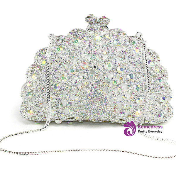 Diamond peacock female hand holding diamond bag