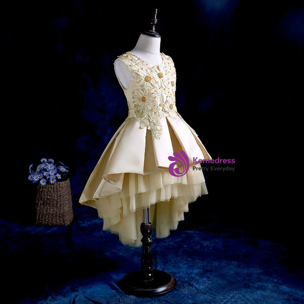 The princess's puffy dress high low gold tulle flower girl dress