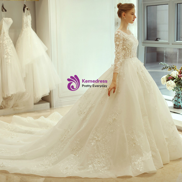 White Ball Gown Long Sleeve Backless Tulle Wedding Dress
