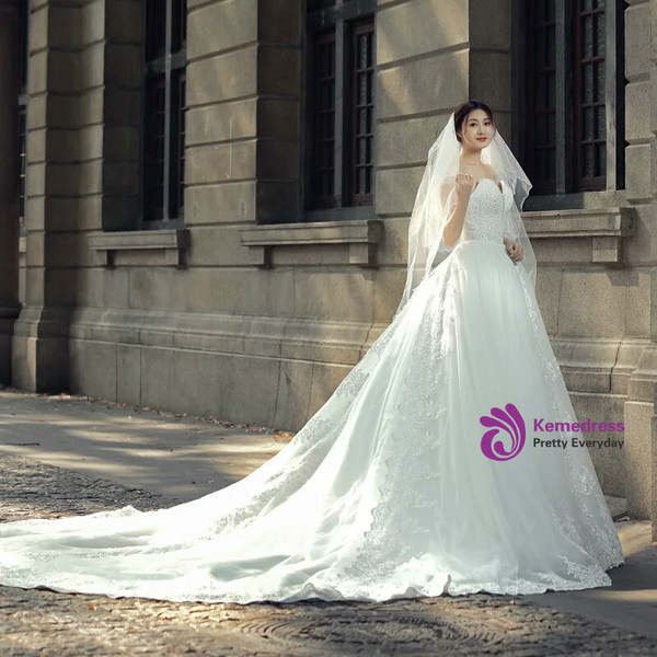 White Ball Gown Sweetheart Tulle Beading Appliques Wedding Dress