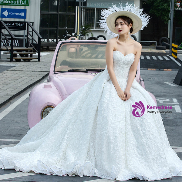 White Ball Gown Tulle Sweetheart Neck Backless Wedding Dress