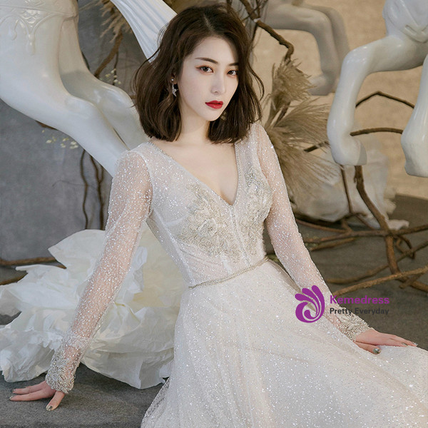 Light Champagne Long Sleeve V-neck Backless Sequins Wedding Dress