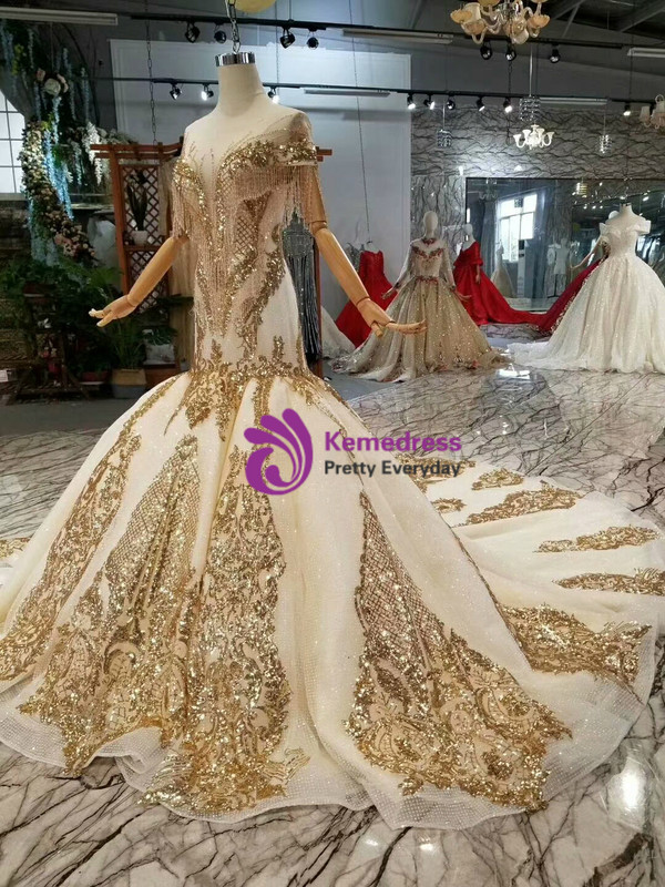 Champagne Tulle Sequins Mermaid Cap Sleeve Backless Wedding Dress With Train