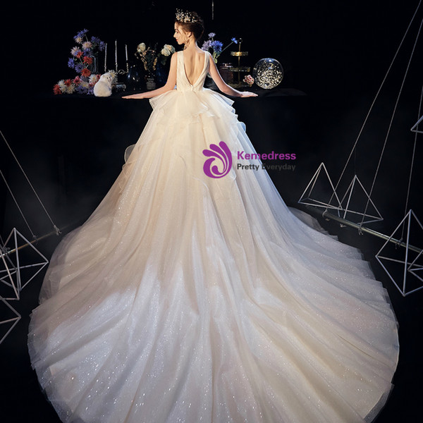 Fantastic Champagne Tulle See Through V-neck Backless Wedding Dress