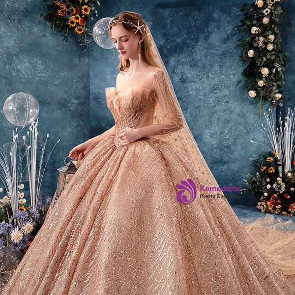 Gorgeous Champagne Gold Ball Gown Sequins Long Sleeve Backless Wedding Dress With Long Train