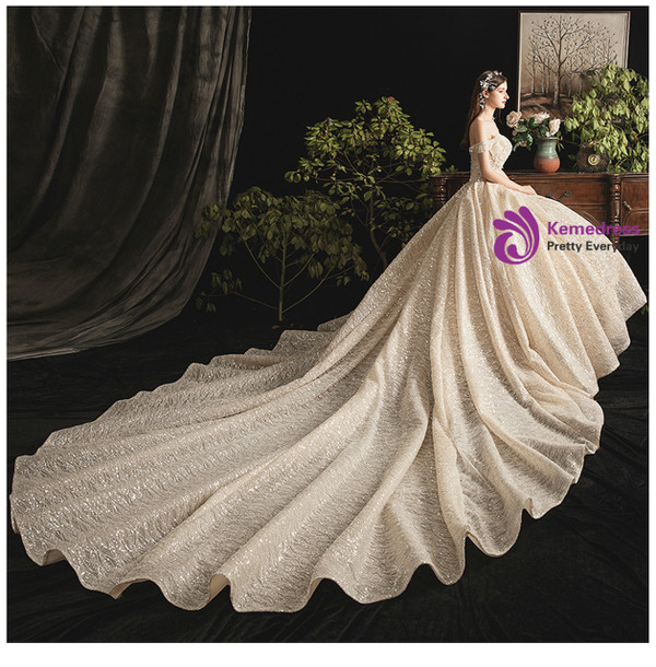 Champagne Sequins Off the Shoulder Sleeveless Wedding Dress With Long Train