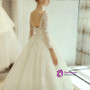 White Ball Gown Long Sleeve Backless Tulle Wedding Dress