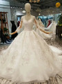Ball Gown Tulle Lace Appliques Long Sleeve Bateau Wedding Dress With Beading