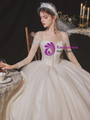 Queenly Champagne Tulle Long Sleeve Beading Backless Illusion Wedding Dress