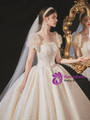 Champagne Scoop Neck Tulle Puff Sleeve Illusion Backless Beading Wedding Dress