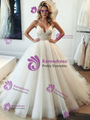 White Tulle V-neck Spaghetti Straps Beading Wedding Dress