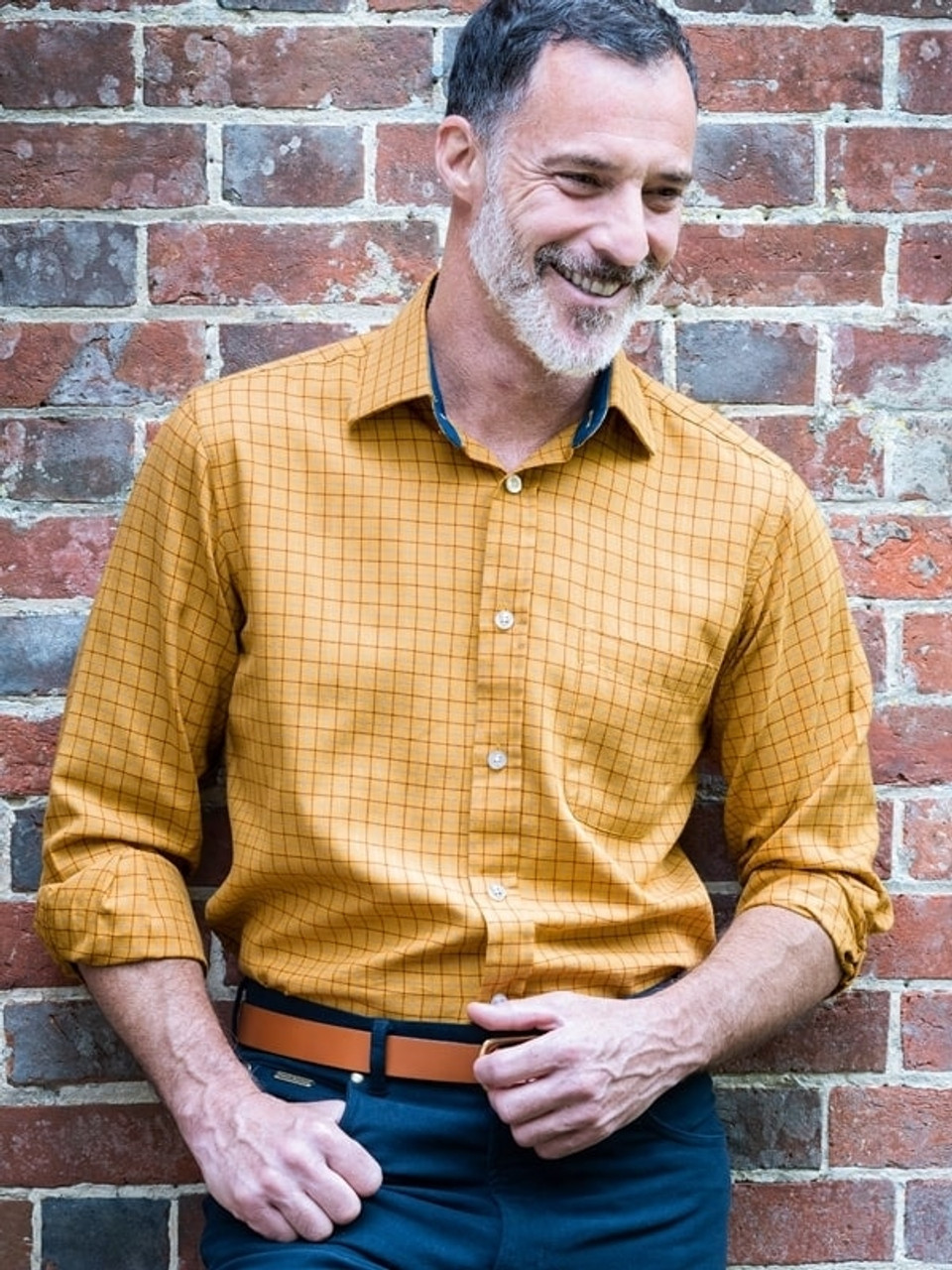 Knitted String Bag Weighs On A Vintage Brick Wall Stock Photo