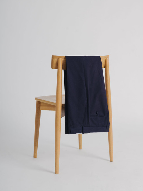 Men's Navy Blue Flat Front Chino Pants on Chair