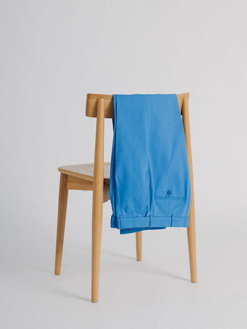 Men's Blue Pleated Chino Pants on Chair