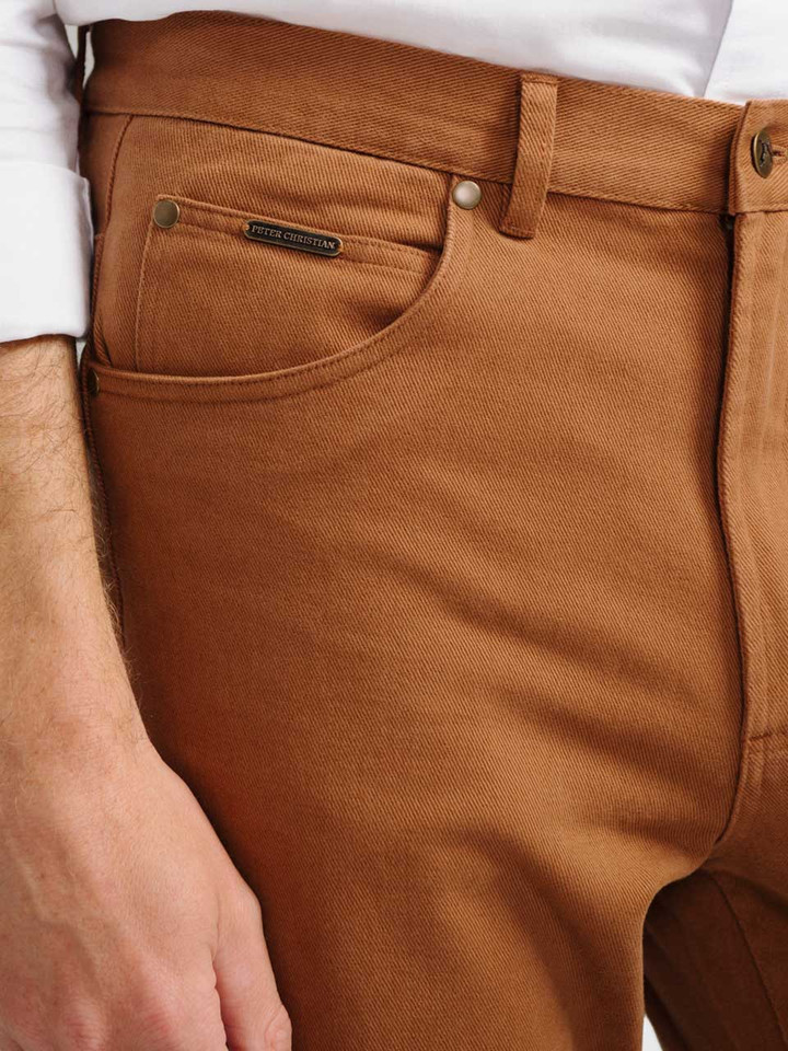 Model wears Men's Tan Brown Drill Jeans Pocket Detail