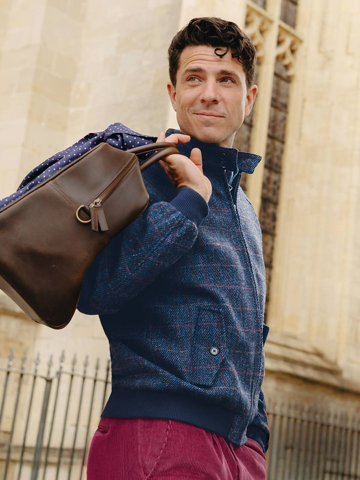 Model wears Navy Harris Tweed® Harrington Jacket