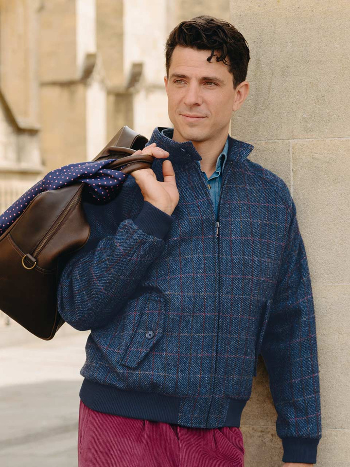 Model wears Navy Harris Tweed® Harrington Jacket Zipped Up