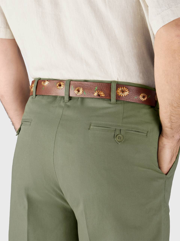 Model wears Men's Green Cotton Pleated Dress Shorts Back Pockets