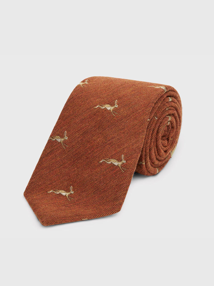 Rust Leaping Hares Tie Rolled