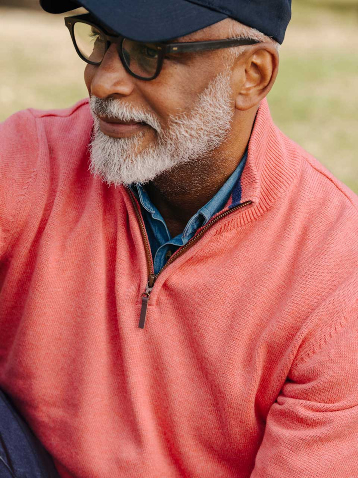 Mens Coral Pink Quarter Zip Sweater On Model Closeup