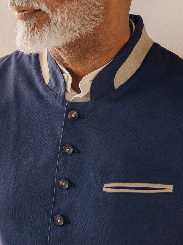 Mens Navy Alpine Vest On Model Collar Closeup