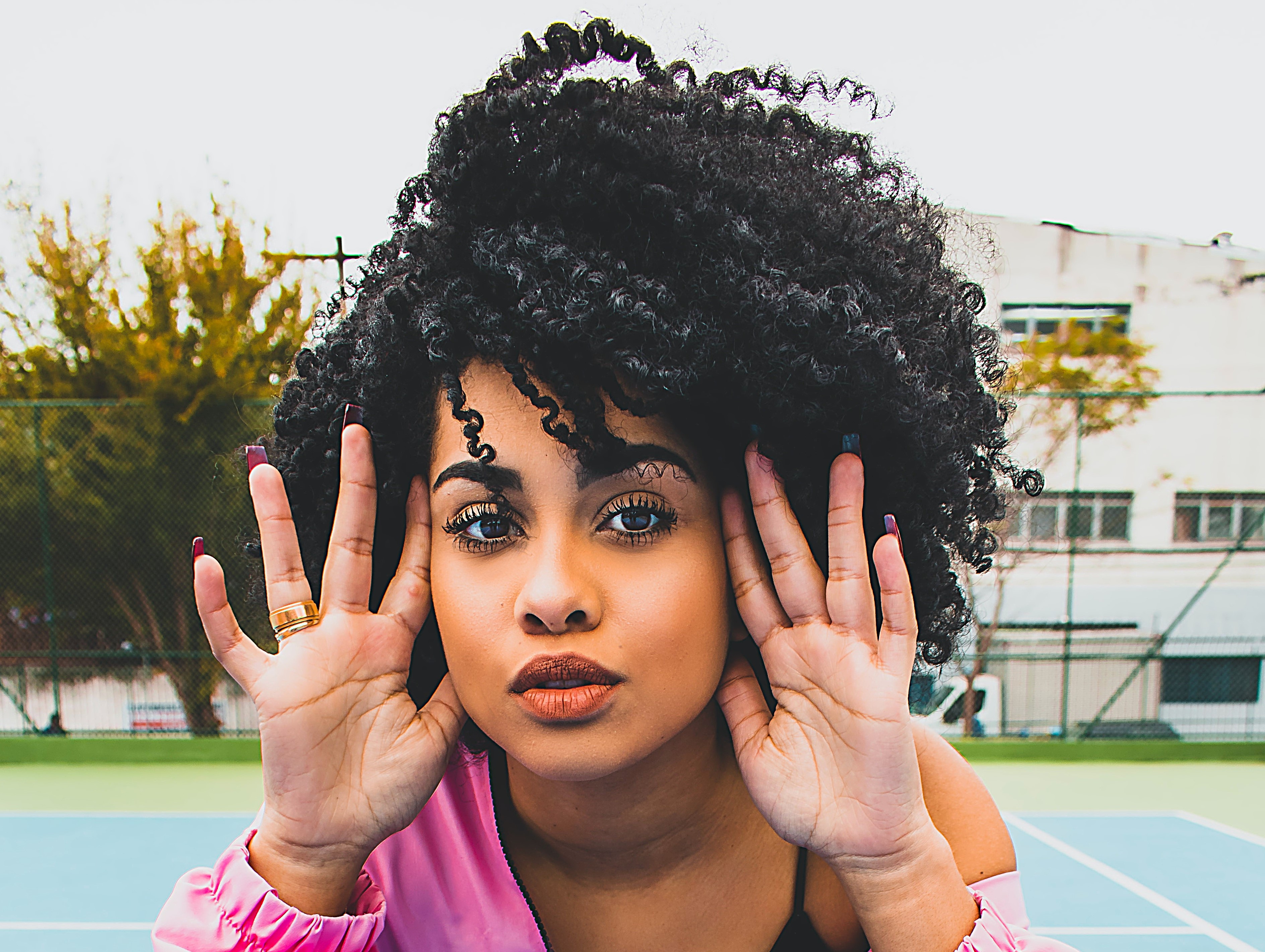 Image of Afro blunt cut curly hair