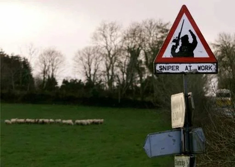 The Story Behind the IRA’s “Sniper at Work” Sign
