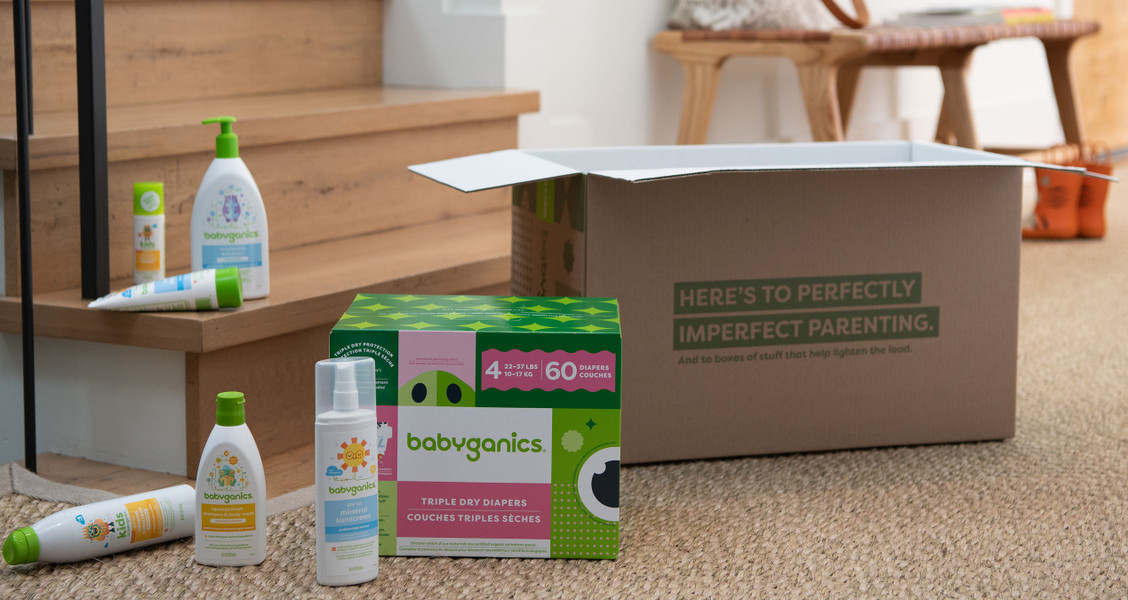 A variety of Babyganics products on the floor of a home