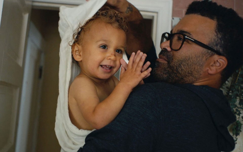 A man holding a baby