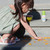 little girl playing with product shot of alcohol-free foaming hand sanitizer, fragrance free, on-the-go in the background