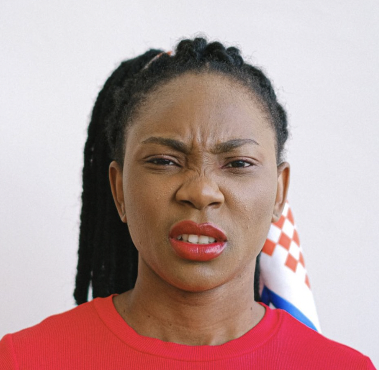 woman disgusted face