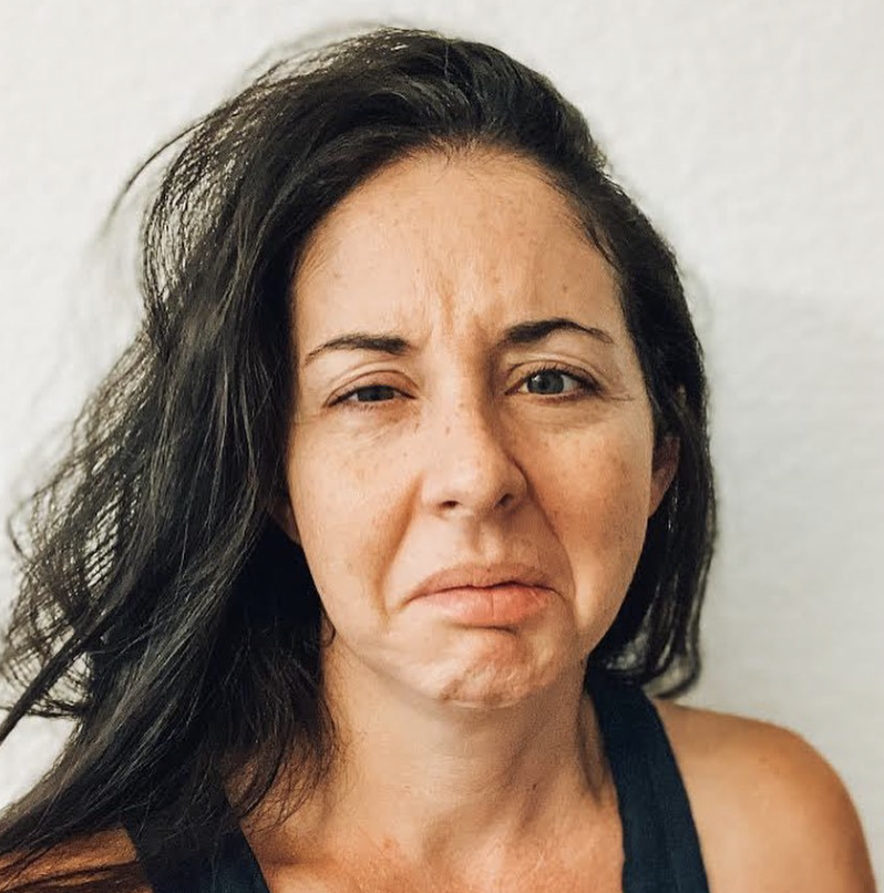 woman disgusted face