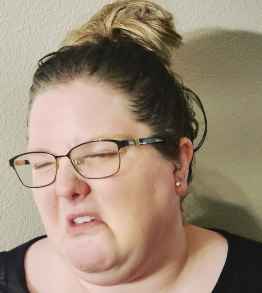 woman disgusted face