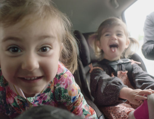 Two kids in their car seats