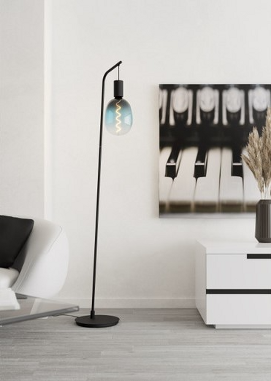 Black floor lamp with slight lean