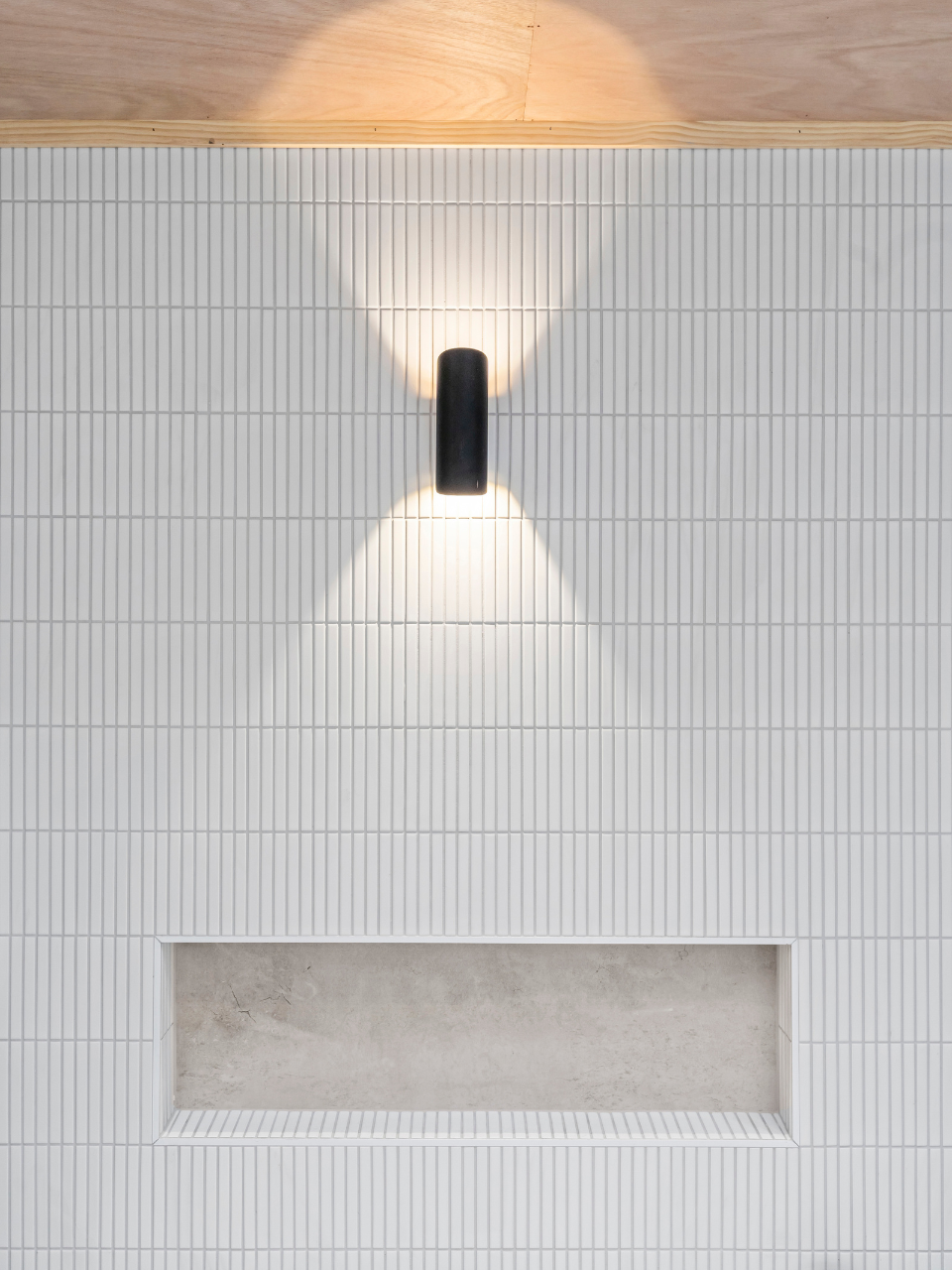 Matt black wall light with IP54 rating