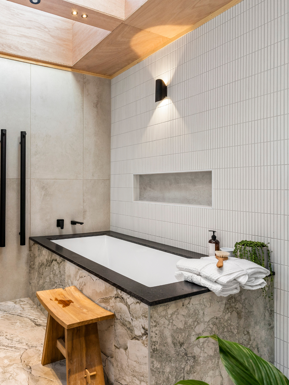 Matt black wall light with IP54 rating