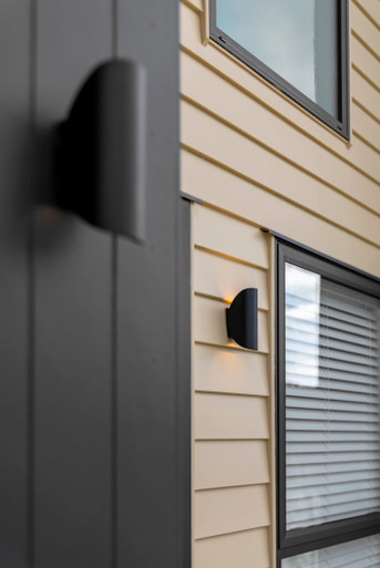 Matt black wall light with IP54 rating