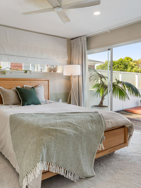 Teak floor lamp with white shade