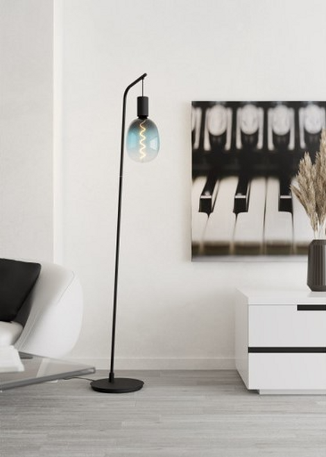 Black floor lamp with slight lean Black floor lamp with slight lean