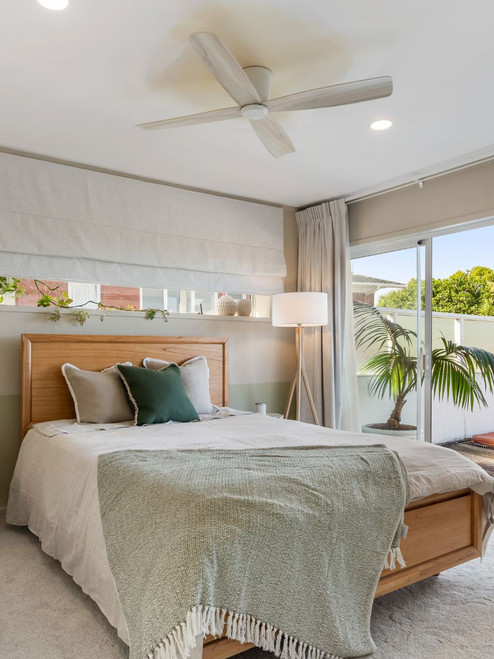 White close to ceiling fan with 52" white wooden blades White close to ceiling fan with 52" white wooden blades