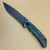 Spartan Knives Special Edition Harsey Oculus Manual Knife Frame Lock Dark Green Titanium [3.95"  Acid Etched Damascus] Drop Point SF5CUSTOMCNDAMOCULUSGR